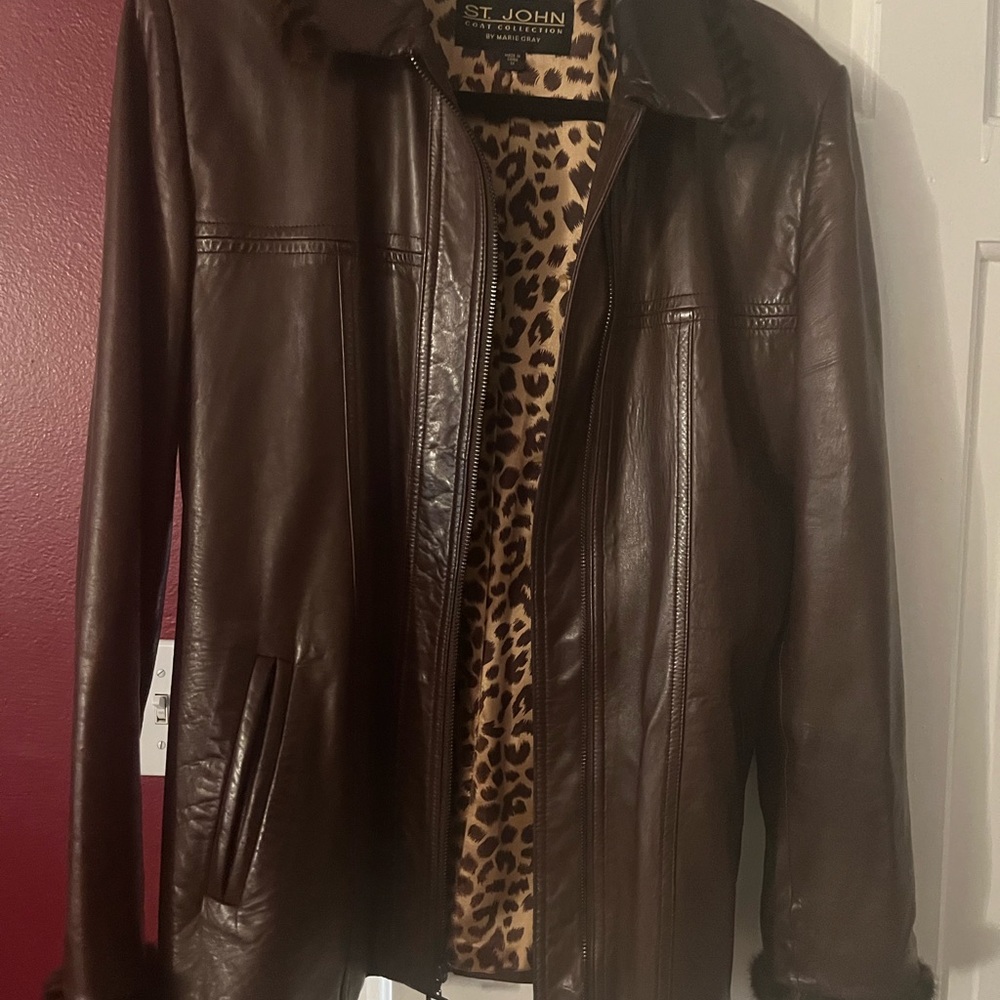 Women’s size medium authentic leather jacket.